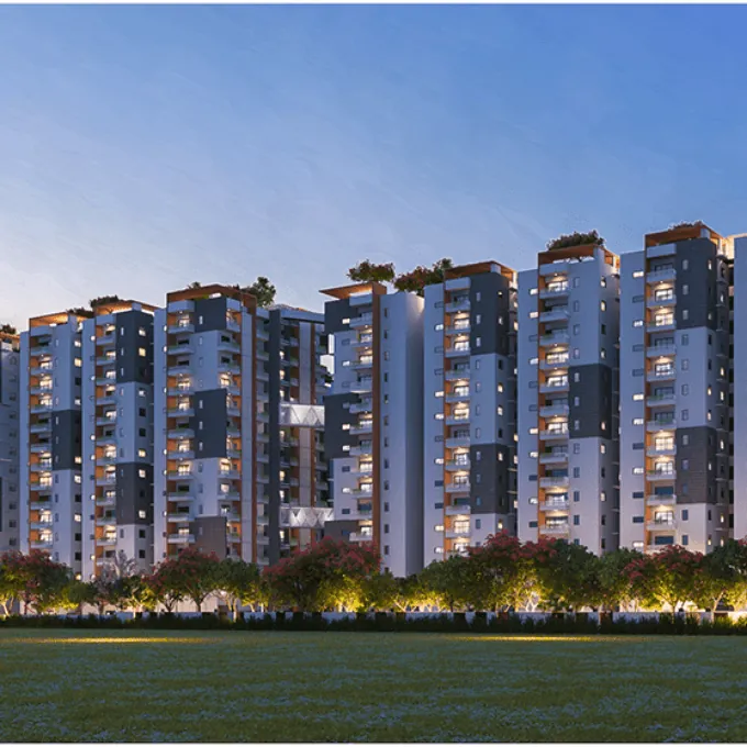 Hallmark Skyrena, Narsingi, artistic impression Apartment towers lit at dusk above a lawn at Hallmark Skyrena