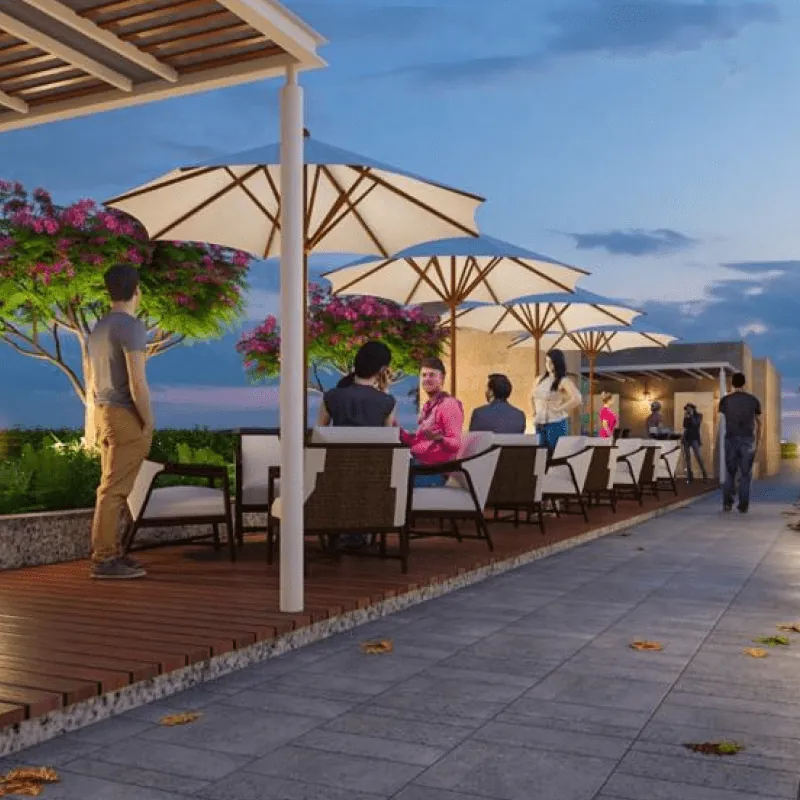 Hallmark Skyrena, Narsingi, artistic impression An open-air café terrace with umbrellas at Hallmark Skyrena, at dusk